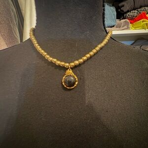 Elegant Gold and Black Pendant Necklace